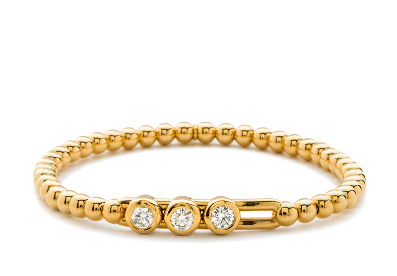 18kt yellow gold stretch bracelet set with 3  sliding diamonds